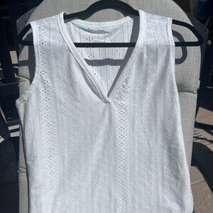 White eyelet style tank top. V neck. NWOT